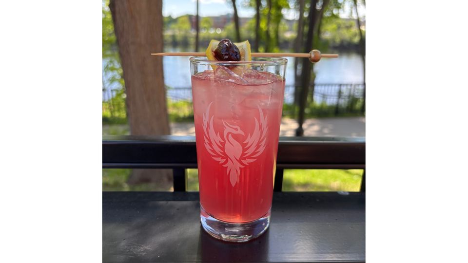 A visualization of the menu item "Pom Collins"