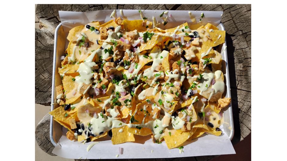 A visualization of the menu item "NFL Sunday Nacho feature-"
