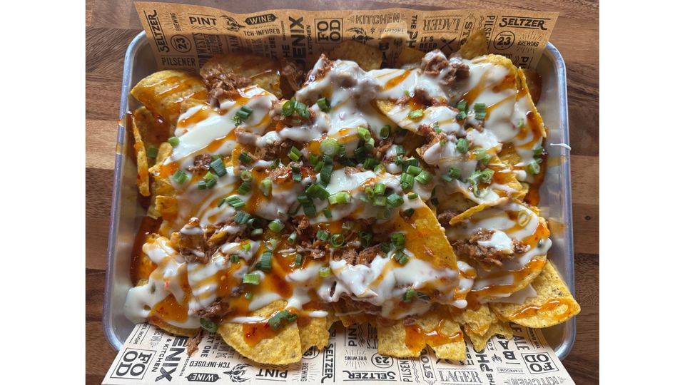 A visualization of the menu item "Phoenix Loaded Nachos"