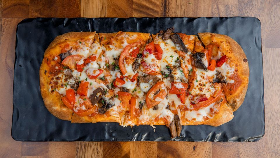 A visualization of the menu item "Veggie Flatbread"