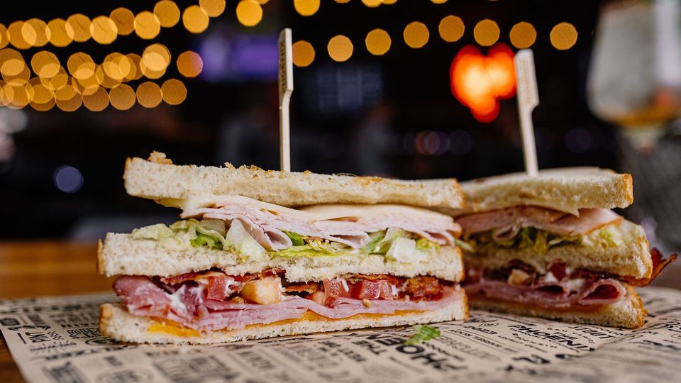 A visualization of the menu item "Phoenix Club Sandwich"