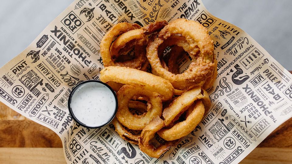 A visualization of the menu item "Whiskey Battered Onion Rings"