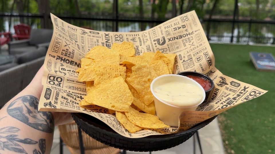 A visualization of the menu item "Chips & Queso"
