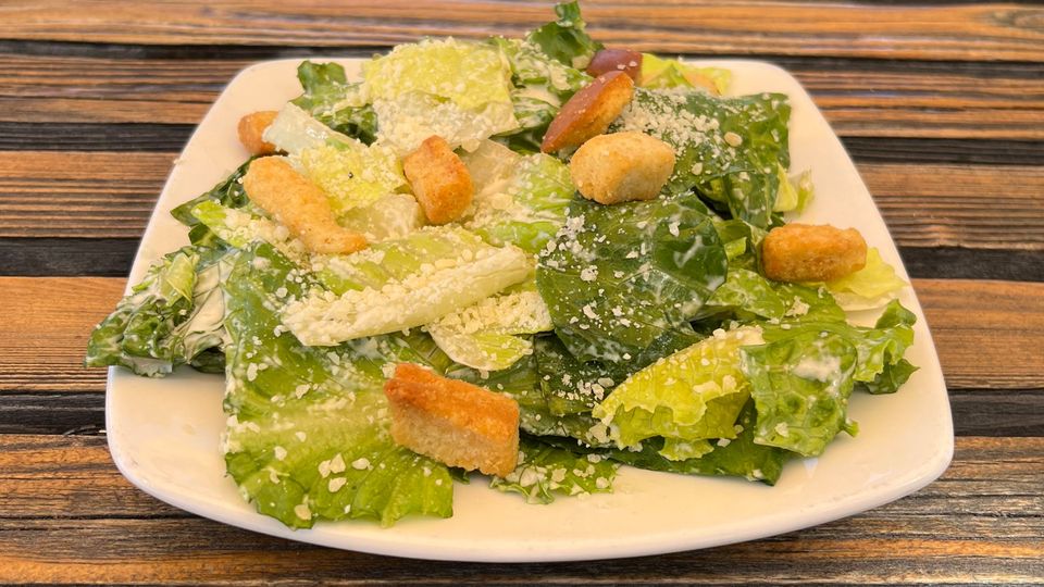 A visualization of the menu item "Side Caesar salad"