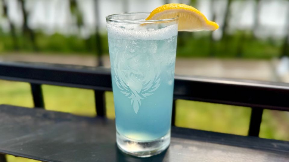 A visualization of the menu item "Blue Raspberry or Grape Fizz"